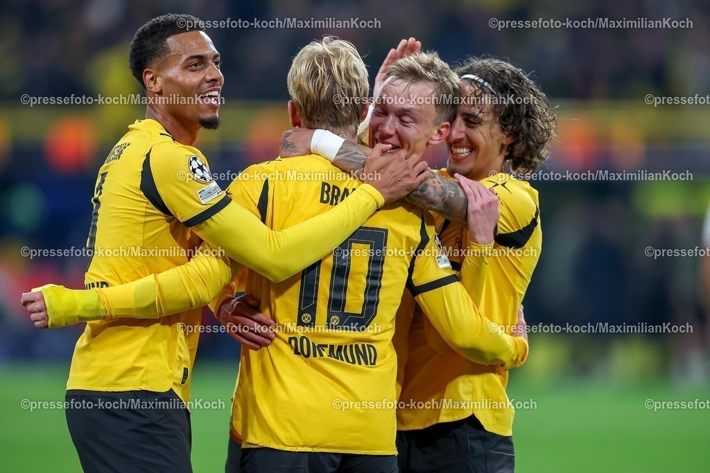 UCL01102501130 | 01.10.2025, Fußball, UEFA Champions League, Borussia Dortmund - Athletic Club Bilbao, BVB Stadion, 2. Spieltag, Saison 2025 2026: Torjubel nach dem Tor zum 4:1 durch Torschütze Julian Brandt (BVB #10)  zusammen mit  Felix Nmecha (BVB #08) Maximilian Beier (BVB #14) Fabio Silva (BVB #21) Regulations prohibit any use of photographs as image sequences and or quasi-video.