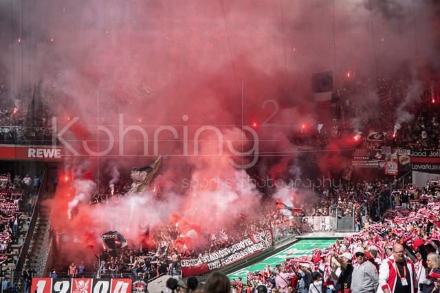German Bundesliga,  1. FC Koeln - Bayer 04 Leverkusen, 25.04.2026 | KOELN, GERMANY - APRIL 25, 2026 :  Leverkusen uses pyro-fireworks during the German Bundesliga match on gameday 31 between 1. FC Koeln - Bayer 04 Leverkusen at RheinEnergieSTADION on April 25, 2026 in Koeln, Germany. DFL REGULATIONS PROHIBIT ANY USE OF PHOTOGRAPHS AS IMAGE SEQUENCES AND/OR QUASI-VIDEO.