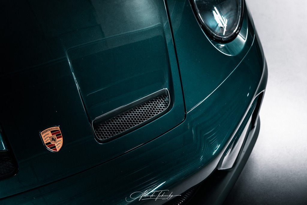 911 GT3 Touring Arlogrünmetallic | Entdecken Sie die faszinierende Welt von Alexander Tschuncky Arts: Kreative Fotografie, atemberaubende Automobilkunst und hochwertiger Bilderdruck. Lassen Sie sich inspirieren! - Realisiert mit Pictrs.com