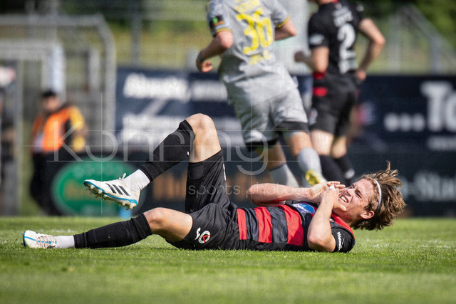 German 3rd Division, Viktoria Koeln vs. Alemannia Aachen, 10.05.2026 | KOELN, GERMANY - MAY 10, 2026:  Tim Kloss (Viktoria Köln, 18) has pain during the 3rd division match on gameday 37 between Viktoria Koeln vs. Alemannia Aachen at the Sportpark Hoehenberg on May 10, 2026 in Koeln, Germany. DFL REGULATIONS PROHIBIT ANY USE OF PHOTOGRAPHS AS IMAGE SEQUENCES AND/OR QUASI-VIDEO.
