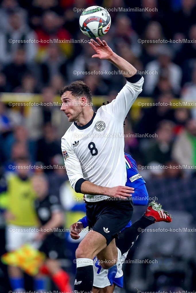 DFB23032501083 | 23.03.2025, Fußball, Viertelfinale UEFA Nations League, Deutschland - Italien, Signal Iduna Park, Saison 2024 2025: Leon Goretzka (GER #08) Kopfballduell gegen Alessandro Buongiorno (ITA #04) DFB regulations prohibit any use of photographs as image sequences and or quasi-video.