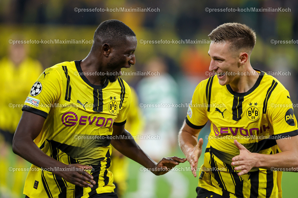 BVB01102402218 | 01.10.2024, Fußball, UEFA Champions League, Borussia Dortmund - Celtic Glasgow, 2. Spieltag, Signal Iduna Park, Saison 2024 2025: Torjubel 6:1 durch Serhou Guirassy (BVB #9) zusammen mit Nico Schlotterbeck (BVB #4)