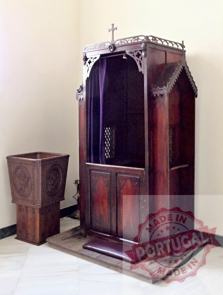 Traditional wooden confessional box in a Catholic church | Wooden confessional box with purple curtain, symbolizing forgiveness and penance inside a church - Realisiert mit Pictrs.com