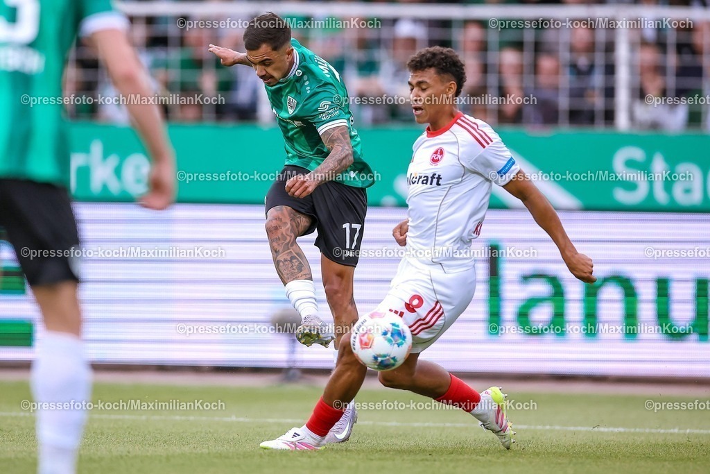 PRM22082501037 | 22.08.2025, Fußball, Preußen Münster - 1. FC Nürnberg, 2. Fußball Bundesliga,  Preußenstadion, Saison 2025 2026: Oliver Batista Meier (Preussen Muenster #17) beim Schuss auf das Tor gegen Henri Koudossou (1FC Nuernberg #08)  DFB regulations prohibit any use of photographs as image sequences and or quasi-video.