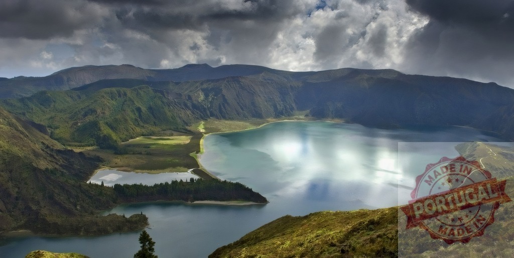 Lagoa do Fogo crater lake with dramatic sky | Lagoa do Fogo, a volcanic crater lake, reflecting dramatic clouds across its turquoise waters - Realized with Pictrs.com