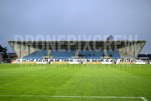 TSV Egger Glas Hartberg vs SV Oberbank Ried – Austrian Bundesliga Match | TSV Egger Glas Hartberg and SV Oberbank Ried. High-intensity match action, tackles, shots on goal, celebrations, fan atmosphere and stadium scenes captured in professional quality. The image shows the new Hartberg Stadion.