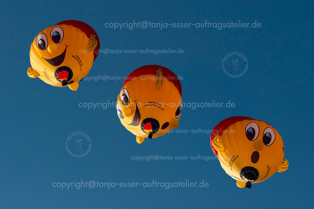 125 Ballon drei Gesichter | Warsteiner Internationale Montgolfiade ist die Veranstaltung mit Heißluftballons. 3 Bilder in einem, Lächelndes Gesicht Heißluftballon. 
