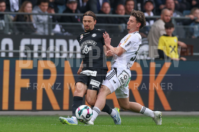 SK Puntigamer Sturm Graz vs TSV Egger Glas Hartberg – Championship Group    | Graz, Austria, 12.Apr.26 - SOCCER - ADMIRAL Bundesliga, SK Puntigamer Sturm Graz vs TSV Egger Glas Hartberg. The image shows Stefan Hierlaender (STU) and Damjan Kovacevic (Hartberg).    