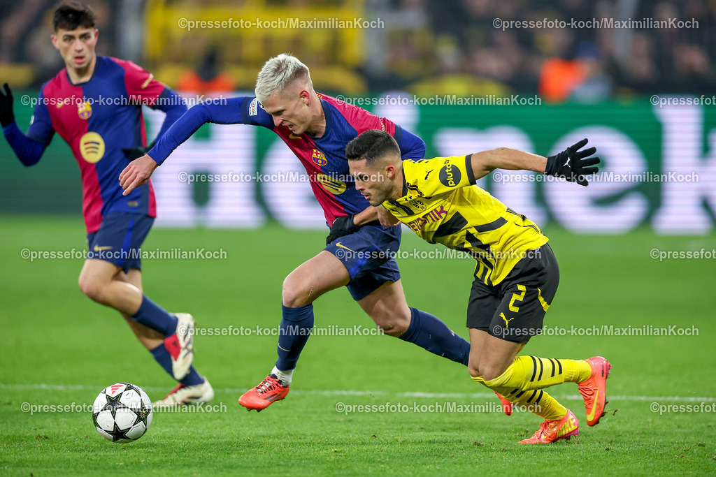 UCL11122401055 | 11.12.2024, UEFA Champions League, Borussia Dortmund - FC Barcelona, 8. Spieltag, Signal Iduna Park, Saison 2024 2025: Yan Couto (BVB #2) im Zweikampf gegen Dani Olmo (Barca #20)