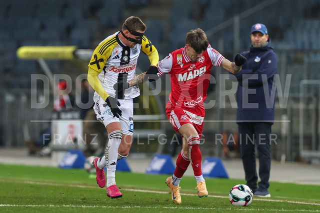 Austrian Bundesliga: Grazer AK 1902 vs LASK | GRAZ, AUSTRIA, 13.DEC.25 - SOCCER - ADMIRAL Bundesliga, Grazer AK 1902 vs LASK. The image shows Kasper Jörgensen (Lask) and Tio Cipot (GAK).