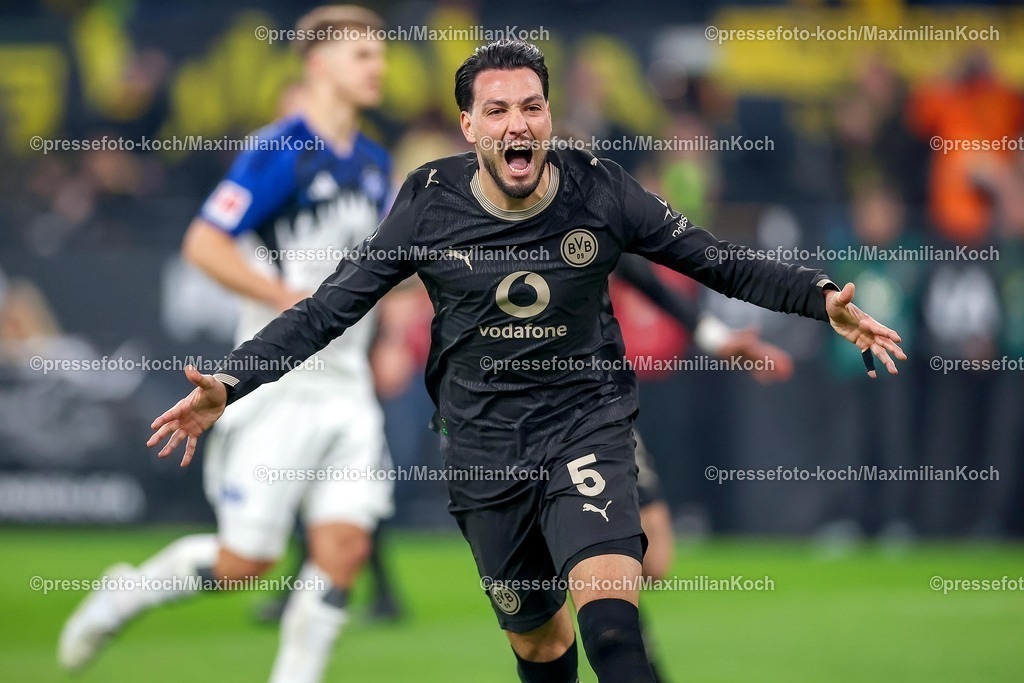 BVB21032601096 | 21.03.2026, Fußball, Borussia Dortmund - Hamburger SV, 1. Fußball Bundesliga, 27. Spieltag, Signal Iduna Park, Saison 2025 2026: Torjubel nach dem Tor zum 3:2 durch Torschütze Ramy Bensebaini&nbsp;(BVB #05)  zusammen mit   DFB regulations prohibit any use of photographs as image sequences and or quasi-video.