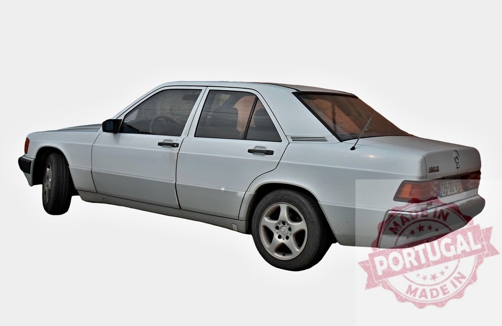 White Mercedes-Benz 190E parked on white background | Classic white Mercedes-Benz 190E automobile parked on a seamless white background, showcasing its vintage style - Realized with Pictrs.com