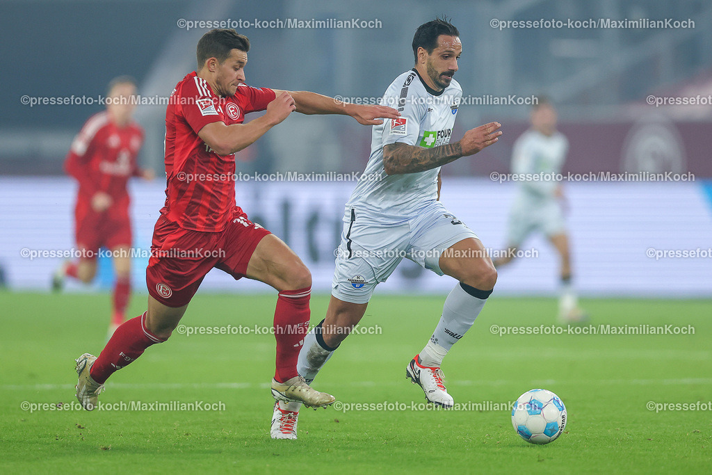 Due0911240109602145 | 09.11.2024, Fußball, Fortuna Düsseldorf - SC Paderborn 07, 2. Bundesliga, Merkur Spiel-Arena, Saison 2024 2025: Tim Oberdorf (Fortuna Düsseldorf #15) gegen Adriano Grimaldi (Paderborn #39) DFB regulations prohibit any use of photographs as image sequences and or quasi-video.