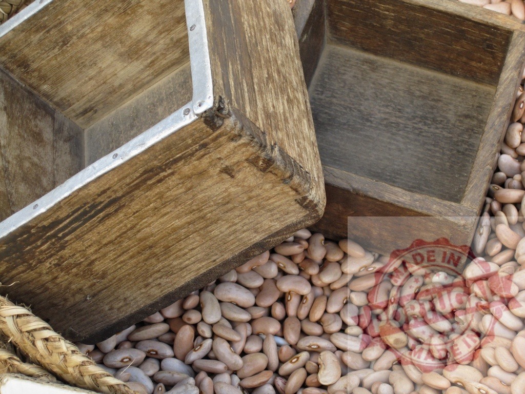 Rustic wooden boxes with dry beans texture | Rustic wooden boxes sitting on a pile of pinto beans - Realized with Pictrs.com