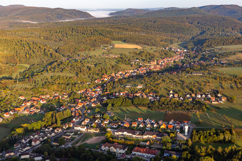 Aerial view: Morning mist covers the valleys of the northern Vosges near Niederbronn. in Langensoultzbach in the state Bas-Rhin, France.Photo: IMG_139165.jpg taken on 10/01/2023 by Werner Riehm/FLY-FOTO.comResolution of the original: 5472 x 3648 px