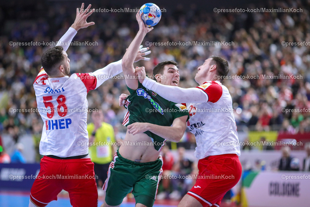 EHFEURO20012402020 | 20.01.2024, EHF EURO 2024, Männer Europameisterschaft Handball, Lanxess Arena in Köln, Ungarn - Kroatien: Gergö Fazekas (Ungarn) gegen Zvonimir Srna (Kroatien) und Tomislav Kusan (Kroatien)