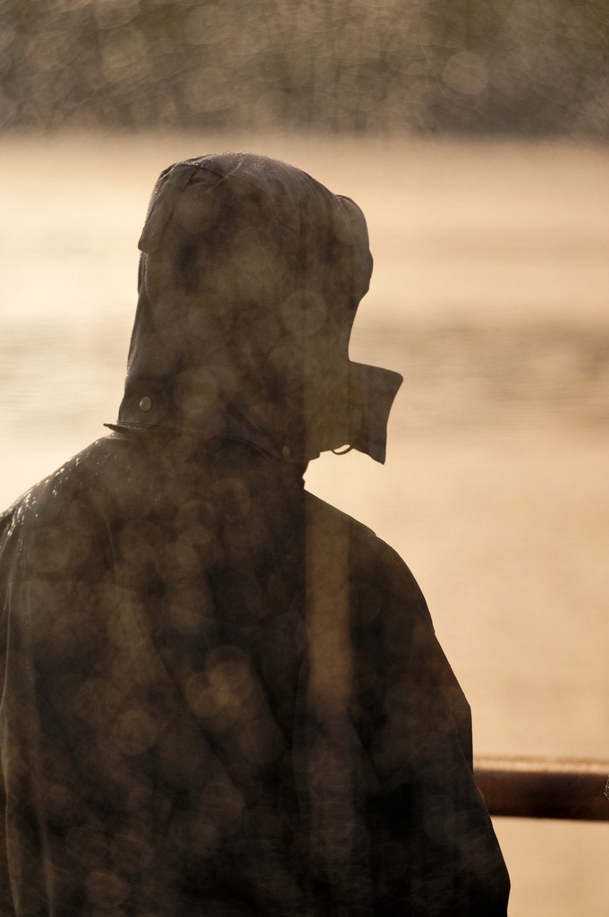 Mann mit Regenjacke | , Norwegen - July 16, 2011: Urlaubsreise in Norwegen; Mann mit Regenjacke - Realisiert mit Pictrs.com