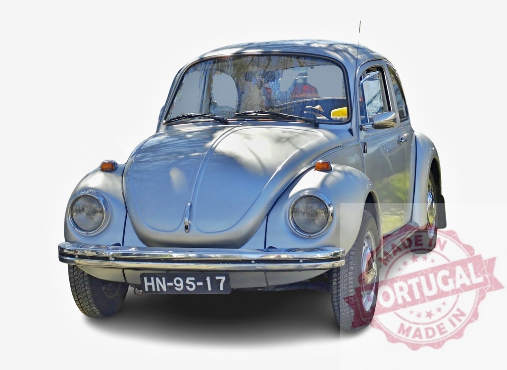 Silver Volkswagen Beetle vintage classic car on white | Silver Volkswagen Beetle classic car on a white background, highlighting retro automotive design - Realized with Pictrs.com