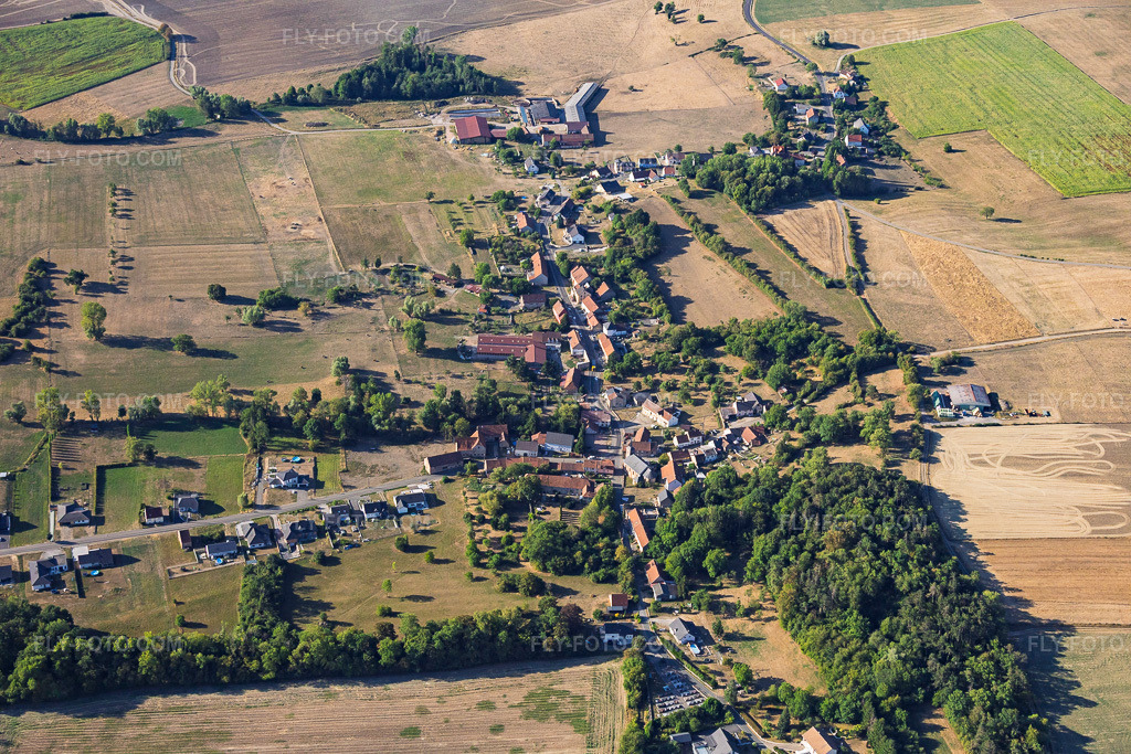 Aerial view: Guising district from the north in Bettviller in the state Moselle, France. – Photo: IMG_158734.jpg taken on 08/14/2026 by Werner Riehm/FLY-FOTO.com – Resolution of the original: 6000 x 4000 px