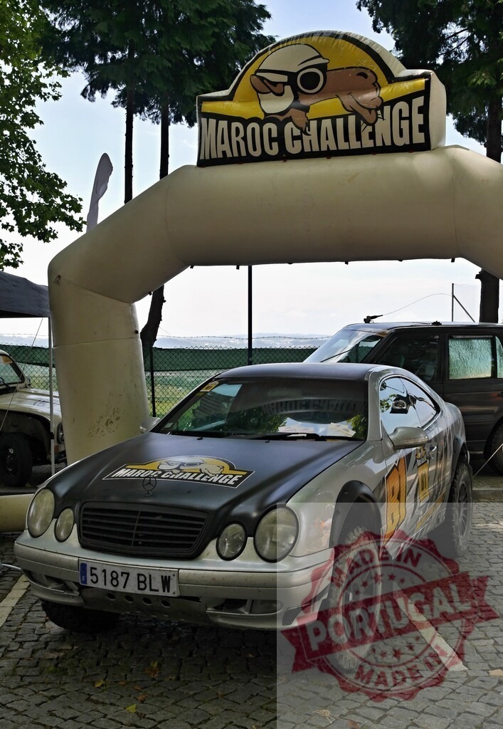 Mercedes-Benz preparing for Maroc Challenge rally adventure | Mercedes-Benz coupe modified for off-road rally under Maroc Challenge inflatable arch - Realisiert mit Pictrs.com
