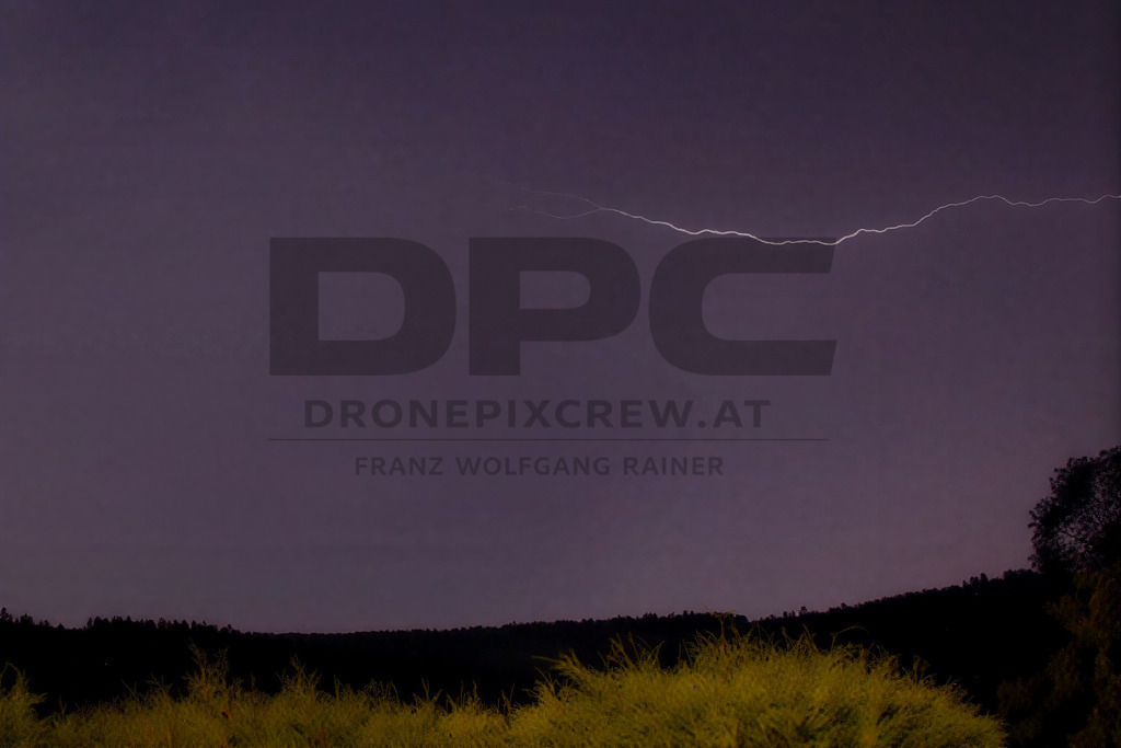 Lightning Storm over the Almenland | Multiple lightning strikes illuminate the night sky over the Almenland region in Austria during a powerful summer thunderstorm. - Realisiert mit Pictrs.com