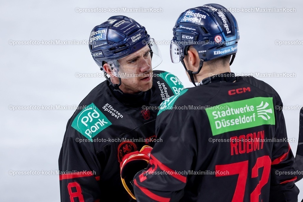 DEG12012501037 | 12.01.2025, Eishockey, Penny DEL, Düsseldorfer EG - Eisbären Berlin, PSD-BANK Dome: Ryan McKiernan (DEG #8) zusammen mit Bennet Rossmy (DEG #72)