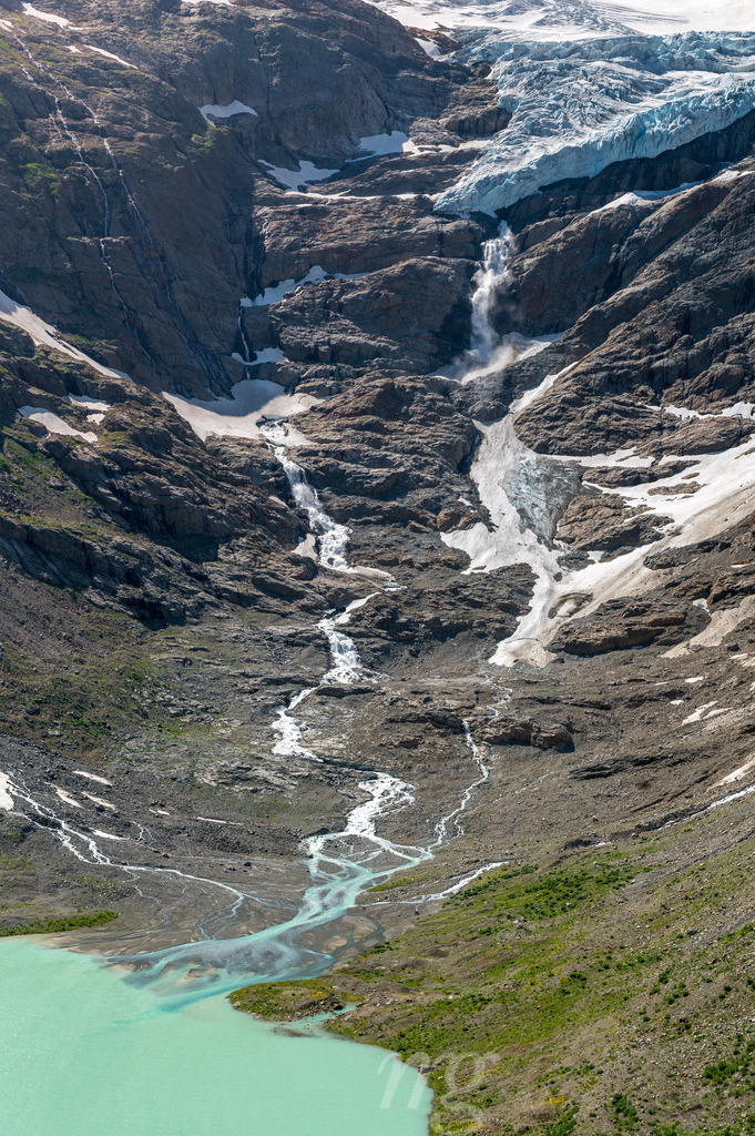 fast shrinking Trift glacier with lake in summer | Die ideale Geschenkidee für Naturliebhaber. Naturbilder von Marcel Gross Photography für ihr Zuhause in den verschiedensten Formaten und Materialien. - Realisiert mit Pictrs.com