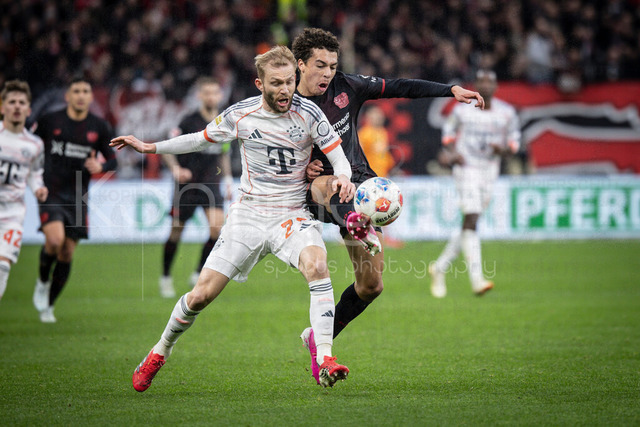 German Bundesliga, Bayer 04 Leverkusen vs. FC Bayern München, 14.03.2026 | LEVERKUSEN, GERMANY - MARCH 14:  Konrad LKaimer (FC Bayern Muenchen, 27) and Montrell Amare Culbreath  (Bayer 04 Leverkusen, 42) tackling during the German Bundesliga match on gameday 26 between Bayer 04 Leverkusen vs. FC Bayern München at BayArena on March 14, 2026 in Leverkusen, Germany. DFL REGULATIONS PROHIBIT ANY USE OF PHOTOGRAPHS AS IMAGE SEQUENCES AND/OR QUASI-VIDEO.