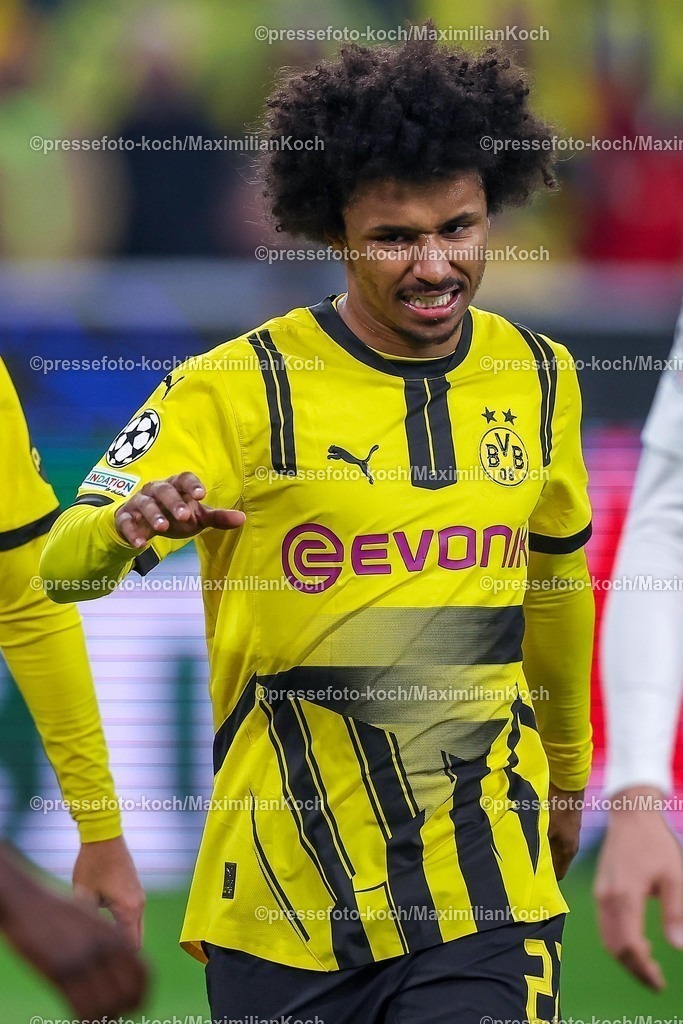 UCL04032502177 | 04.03.2025, Fußball, UEFA Champions League, Borussia Dortmund - OSC Lille, Signal Iduna Park, Runde der 16, Saison 2024 2025: Karim Adeyemi (BVB #27) schneidet eine Grimasse Mimik Gestik