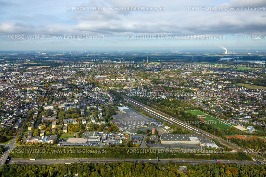 Moers241012655 | Luftbild, Ortsansicht mit Fernsicht, blauer Himmel mit Wolken, vorne Edeka Logistikzentrum und Lager, Alter Feuerwehrturm, Moers-Schwafheim, Moers, Ruhrgebiet, Nordrhein-Westfalen, Deutschland
