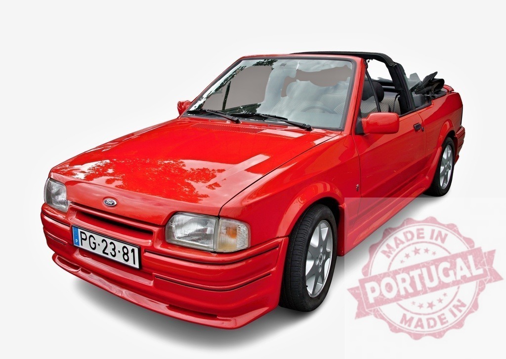 Red Ford Escort Cabriolet XR3i sporting a lowered suspension | Classic red Ford Escort Cabriolet XR3i with lowered suspension and alloy wheels, isolated on white - Realized with Pictrs.com