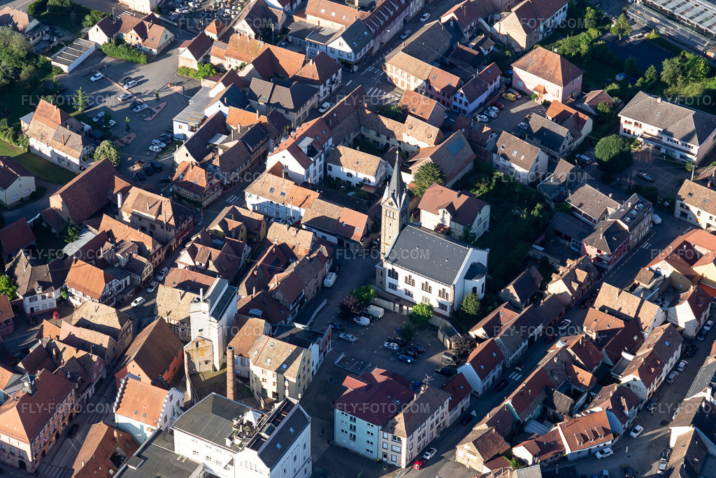 Aerial view: Church building in Pfaffenhoffen in Val de Moder in the state Bas-Rhin, France.Photo: IMG_115447.jpg taken on 06/16/2019 by Werner Riehm/FLY-FOTO.comResolution of the original: 5472 x 3648 px