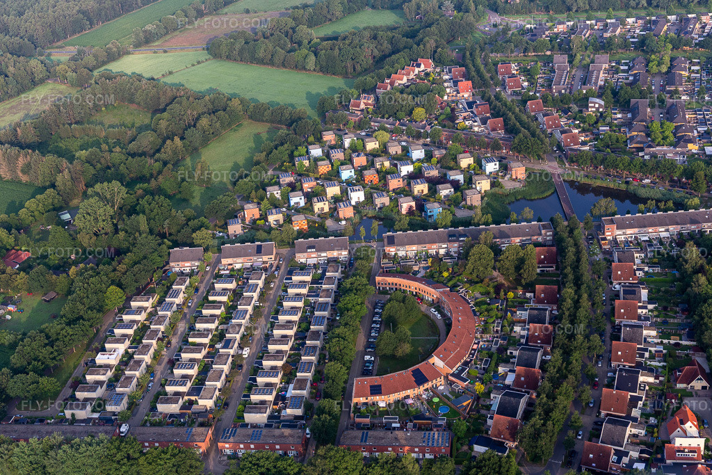 Aerial view: Residential area with colorful, cube-shaped designer single-family homes in a green, waterfront single-family home development. in the district Eekmaat West in Enschede in the state Overijssel, Netherlands.Photo: IMG_008189.jpg taken on 07/18/2020 by Werner Riehm/FLY-FOTO.comResolution of the original: 5472 x 3648 px
