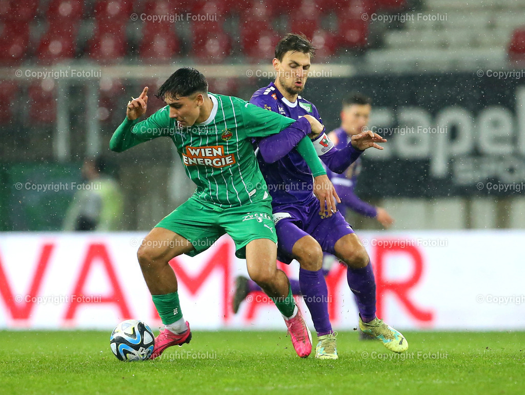 A_LUI_10032024_21 | SPORT,FUSSBALL, ADMIRAL BUNDESLIGA AUSTRIA KLAGENFURT-SK RAPID WIEN 10.03.2024 IM BILD: THORSTEN MAHRER (KLAGENFURT) UND FURKAN DURSUN (RAPID WIEN) FOTO:FOTOLUI/MW