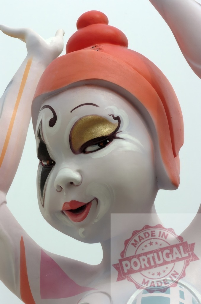 Fallas festival ninot sculpture face with makeup in Valencia | Colorful ninot sculpture face on display during the traditional Fallas festival - Realized with Pictrs.com