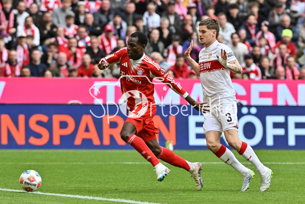 FC Bayern München - VfB Stuttgart | MUNICH, GERMANY - 19. APRIL: tackle between Nicolas JACKSON (FC Bayern Munich 11) and Ramon HENDRIKS (VfB Stuttgart 3) during the Bundesliga Match between FC Bayern Munich vs. VfB Stuttgart at Matchday 30 at Allianz Arena / DFL REGULATIONS PROHIBIT ANY USE OF PHOTOGRAPHS AS IMAGE SEQUENCES AND/OR QUASI-VIDEO