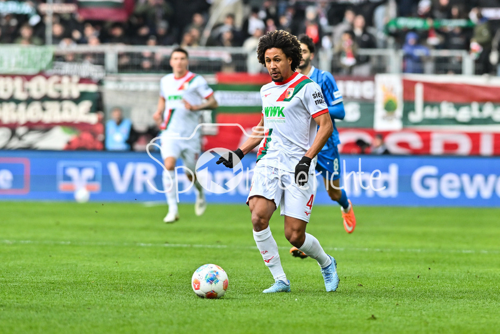 FC Augsburg - 1. FC Heidenheim | AUGSBURG, GERMANY - 15. FEBRUARY: am Ball Han-Noah MASSENGO (FC Augsburg 4) während dem Bundesligamatch zwischen dem FC Augsburg und dem 1. FC Heidenheim am 22. Spieltag in der WWK-Arena / DFL REGULATIONS PROHIBIT ANY USE OF PHOTOGRAPHS AS IMAGE SEQUENCES AND/OR QUASI-VIDEO