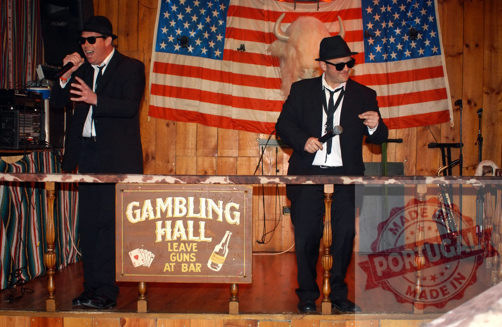 The Blues Brothers impersonators performing live on stage | Blues Brothers tribute band singing on stage in a gambling hall - Realized with Pictrs.com