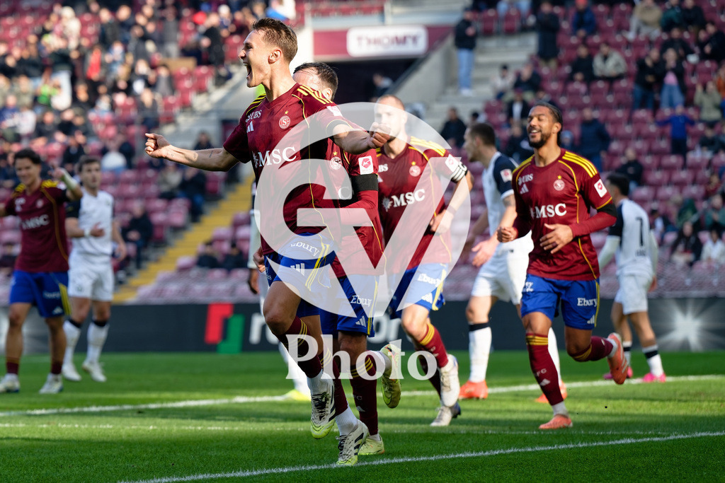 Brack Super League - Servette FC v FC Zurich | Marco Burch (15 Servette FC) celebrates after scoring his team's first goal  during the Brack Super League match between Servette FC and FC Zurich at Stade de Geneve in Geneva, Switzerland