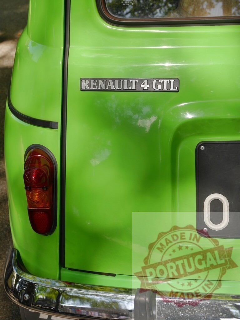 Renault 4 GTL classic car rear detail | Green Renault 4 GTL vintage car showing its rear detailing, taillight, and bumper - Realisiert mit Pictrs.com