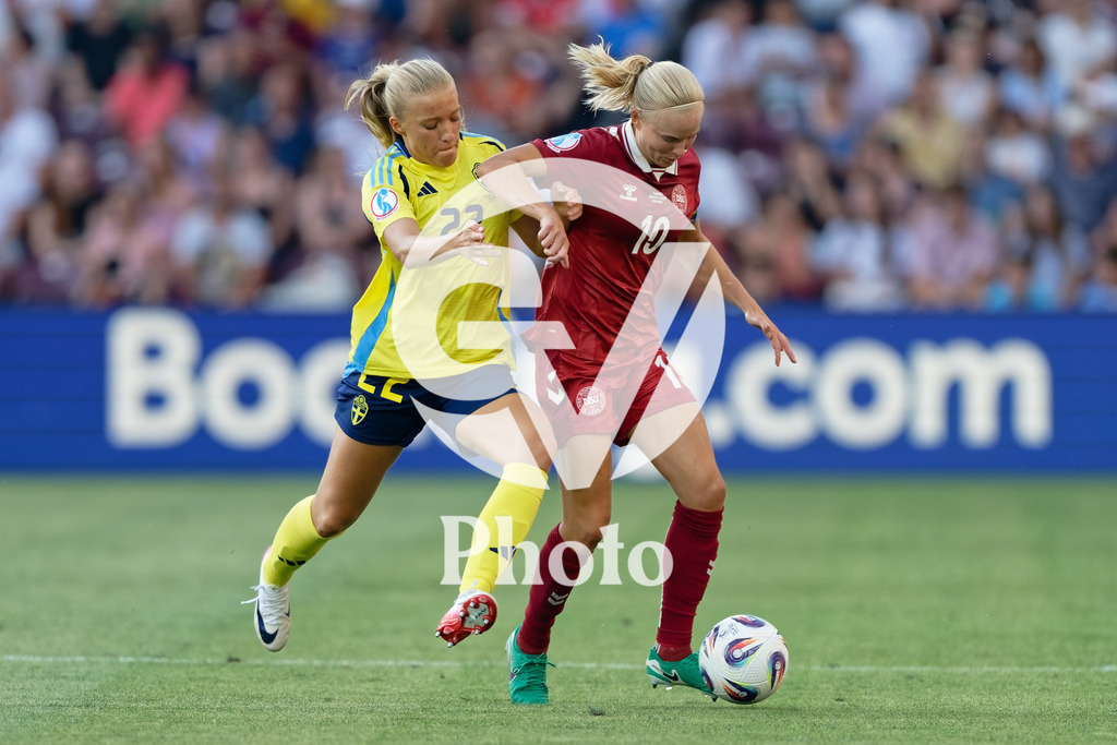 Denmark v Sweden - UEFA Women's EURO 2025 Group C | GENEVA, SWITZERLAND - JULY 4: Pernille Harder of Denmark (R) and Smilla Holmberg of Sweden (L) fight for possession during the UEFA Womens EURO 2025 Group C match between Denmark and Sweden at Stade de Geneve on July 4, 2025 in Geneva, Switzerland. (Photo by Giuseppe Velletri/Sports Press Photo/Getty Images)