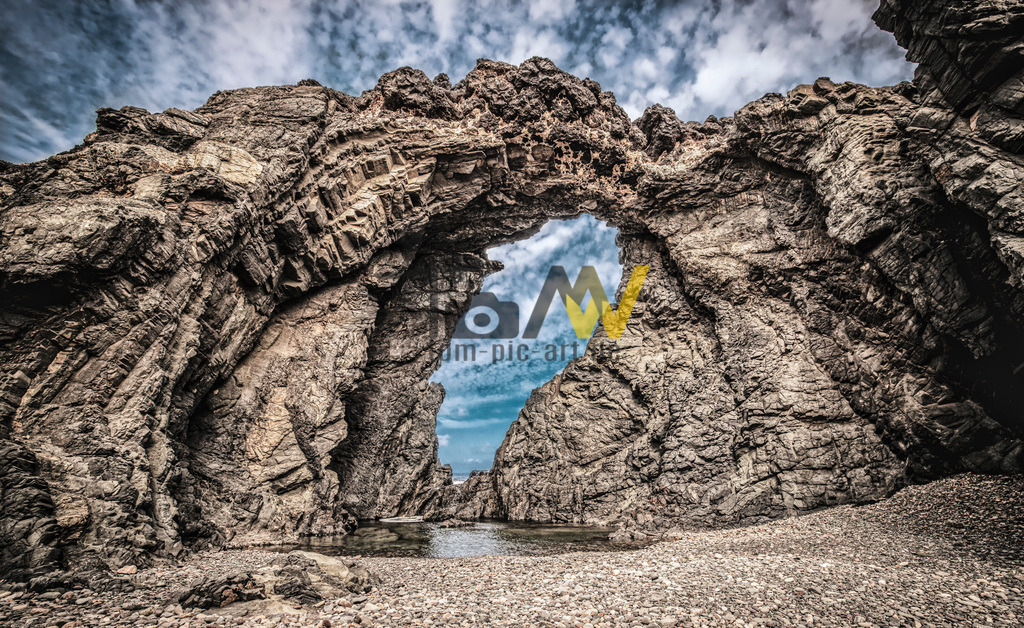 Das Felsentor bei Peña Horadada-Felsskulptur-Fuerteventura | Das Felsentor ist eine tolle Gesteinsformation an der Westküste von Fuerteventura bei Peña Horadada. - Realisiert mit Pictrs.com