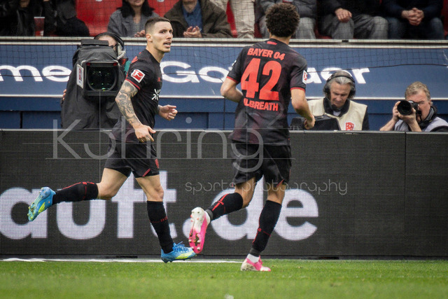 German Bundesliga, Bayer 04 Leverkusen vs. VfL Wolfsburg, 04.04.2026 | LEVERKUSEN, GERMANY - APRIL 4, 2026 :  Alejandro Grimaldo (Bayer 04 Leverkusen, 20) celebrates his penalty goal during the German Bundesliga match on gameday 28 between Bayer 04 Leverkusen vs. VfL Wolfsburg at BayArena on April 4, 2026 in Leverkusen, Germany. DFL REGULATIONS PROHIBIT ANY USE OF PHOTOGRAPHS AS IMAGE SEQUENCES AND/OR QUASI-VIDEO.