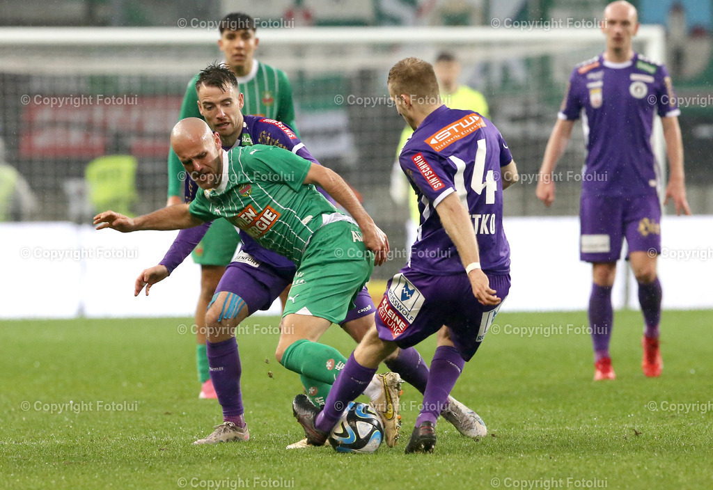 A_LUI_10032024_15 | SPORT,FUSSBALL, ADMIRAL BUNDESLIGA AUSTRIA KLAGENFURT-SK RAPID WIEN 10.03.2024 IM BILD: CHRISTOPHER CVETKO (KLAGENFURT) UND LUKAS GRGIC (RAPID WIEN) FOTO:FOTOLUI/MW