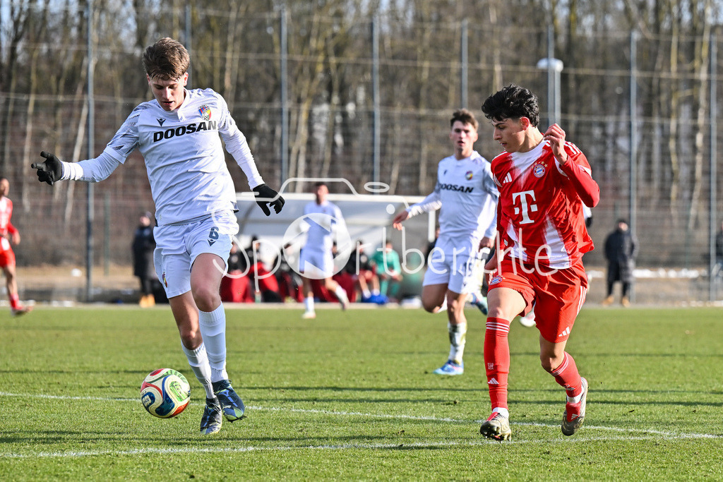 FC Bayern Amateure - FC Viktoria Pilsen U23 | MUNICH, GERMANY - 03. FEBRUARY: im Duell Deniz OFLI (FC Bayern München II 13) mit einem Spieler von Viktoria Pilsen während dem Testspiel zwischen den Amateuren des FC Bayern und dem FC Viktoria Pilsen B am FC Bayern Campus