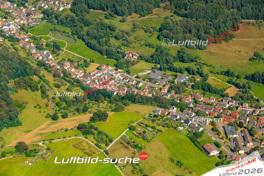 Das Luftbild zeigt :  Heimbuchenthal - Die Luftaufnahme wurde 2024 vom UL-Flugzeug aus erstellt ( keine Drohne ) - Hochauflösende Luftaufnahme - Für grossformatige Ausdrucke geeignet. Die Geschenkidee !Mit Lizenz und Bildrechte bestellbar