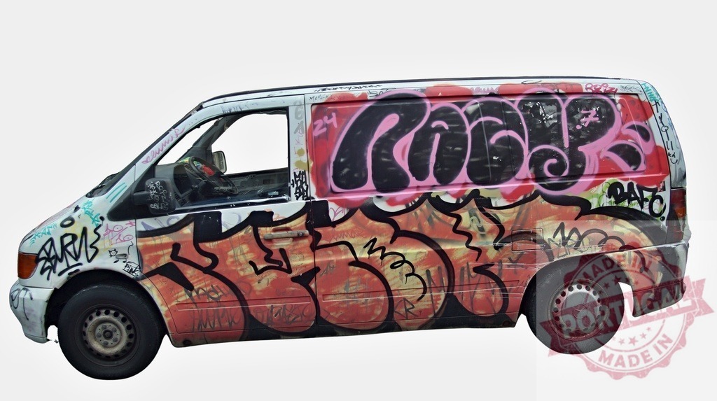 White van covered in colorful graffiti tags | Old white van completely covered with graffiti tags, isolated on white background - Realized with Pictrs.com
