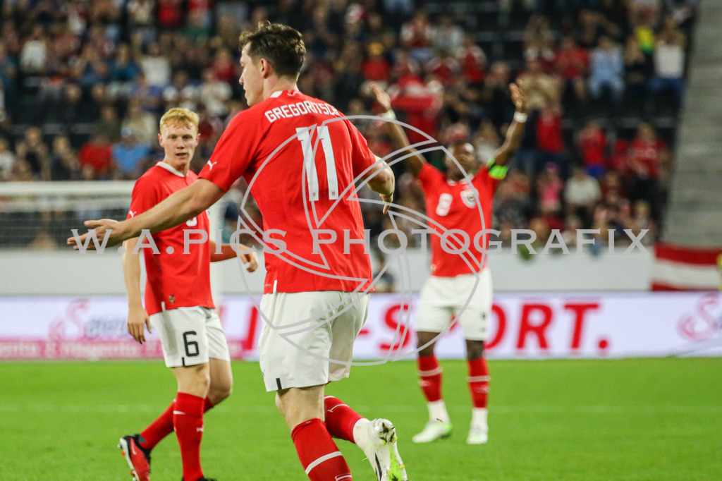 AUSTRIA vs MOLDAVIA | LINZ,AUSTRIA,07.SEPT.23 - INT.SOCCER - AUSTRIA vs MOLDAVIA.  Image shows the rejoicing of Michael Gregoritsch (AUT) and David Alaba (AUT). Photo: Sportmediapics.com/ Andreas Willdoner