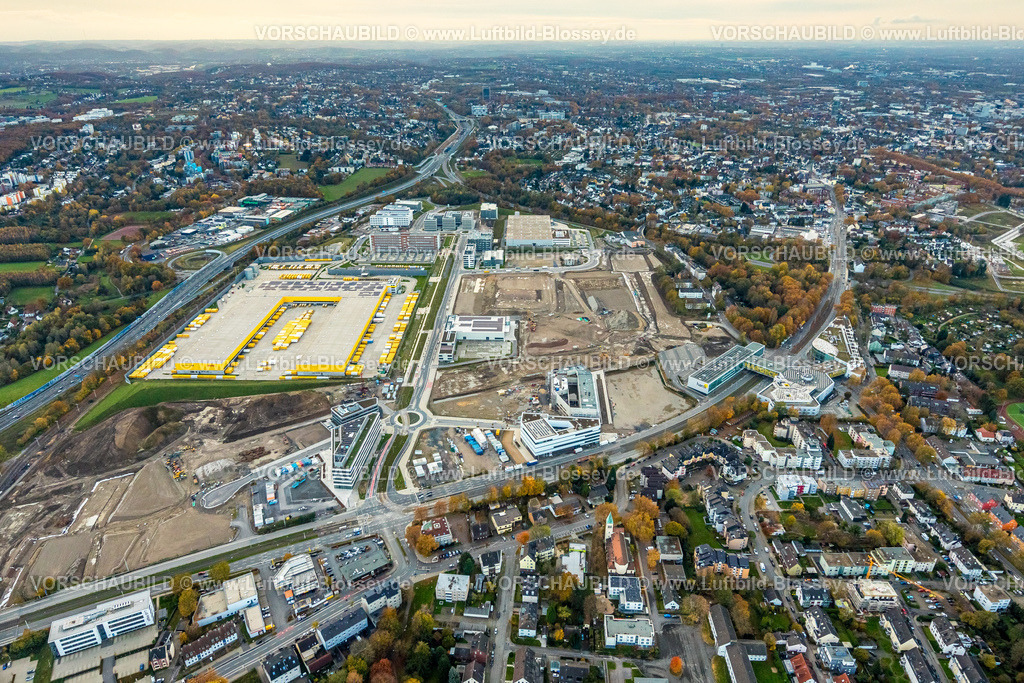 Bochum231102346 | Luftbild, Großbaustelle Mark 51/7, O-Werk Campus und Neubau Wissenschafts- und Technologiequartier, ehemaliges Opel Areal an der Autobahn A448, DHL Logistik, Wohngebiet und Fernsicht mit Ortsansicht Bochum Laer, Bochum, Ruhrgebiet, Nordrhein-Westfalen, Deutschland