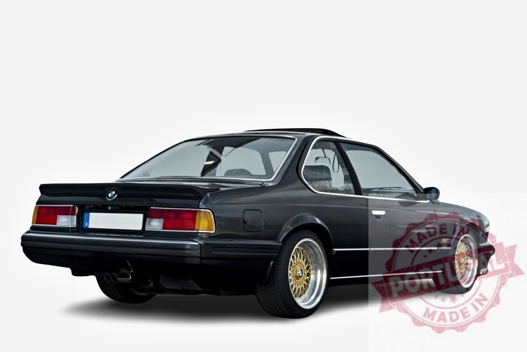 Black BMW 6 Series E24 sports car parked on white background | Classic BMW 6 Series E24 sports car parked on a white background, showcasing its elegant design and sporty features - Realisiert mit Pictrs.com